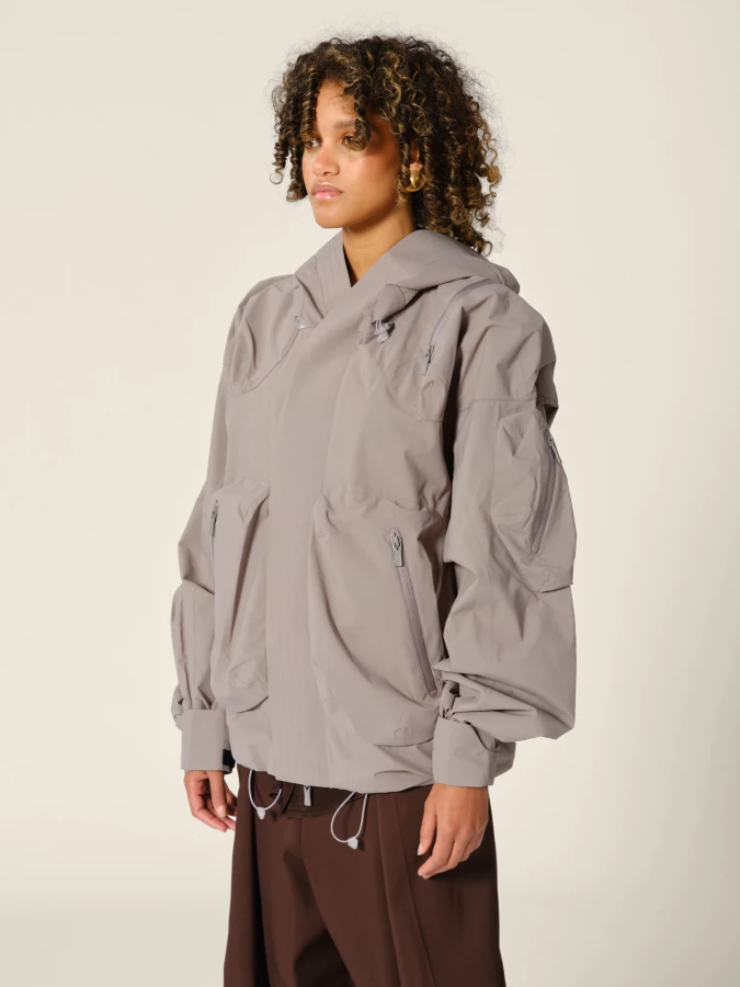 Graphite 'Ascend' shell jacket with hood and 3D pockets