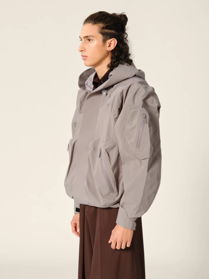 Graphite 'Ascend' shell jacket with hood and 3D pockets
