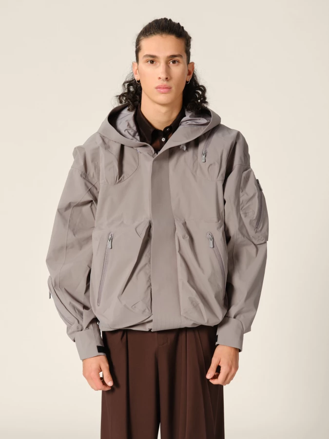 Graphite 'Ascend' shell jacket with hood and 3D pockets