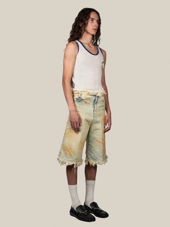 ‘Raw Edges’ Bermuda Shorts in Denim with frayed details