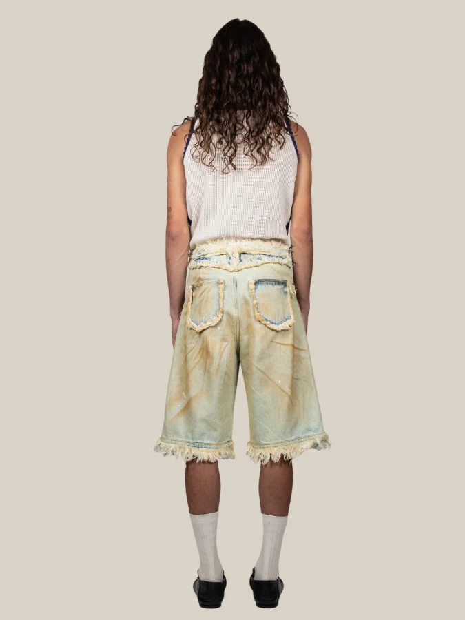 ‘Raw Edges’ Bermuda Shorts in Denim with frayed details